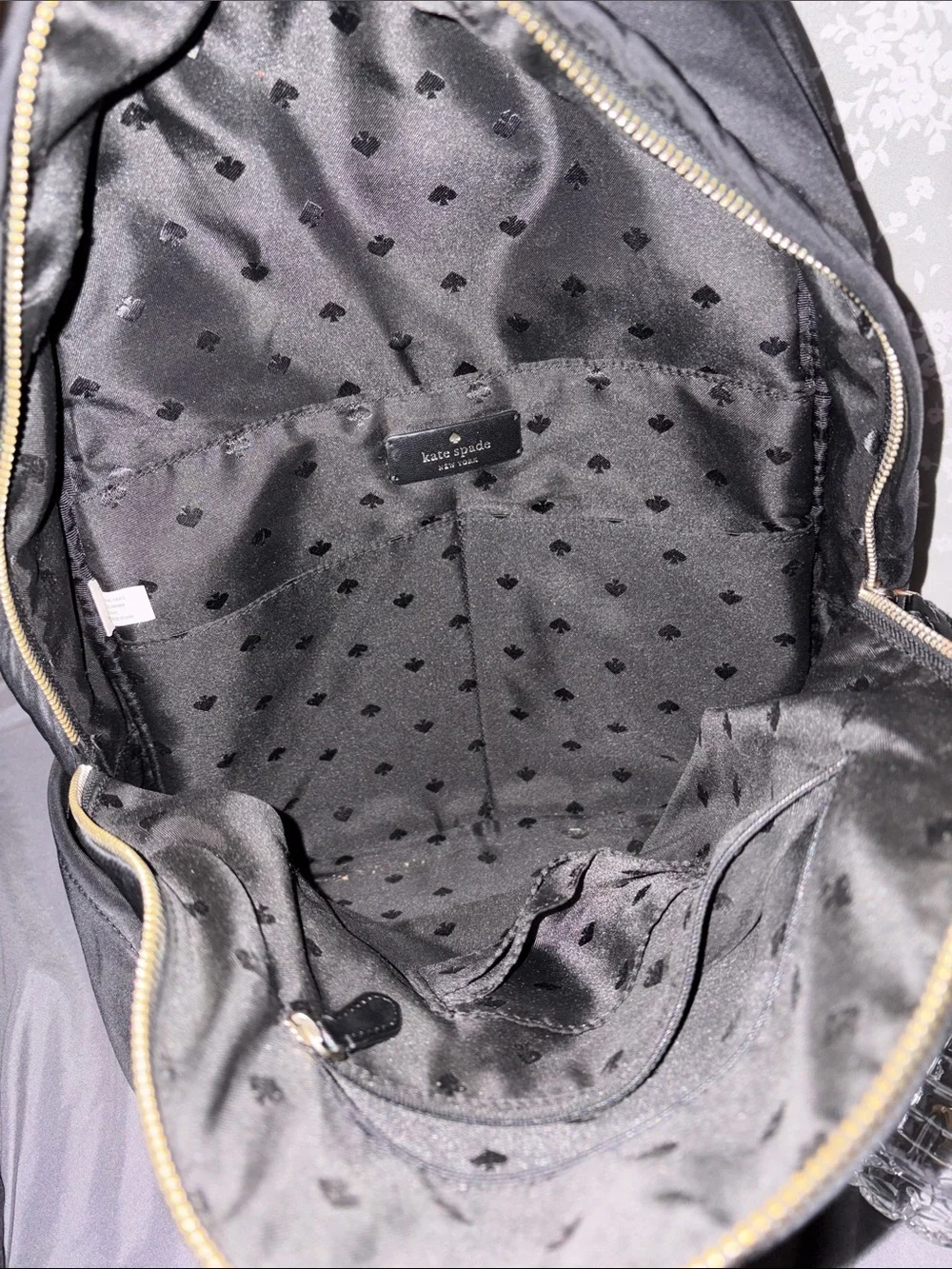 kate spade black nylon backpack with gold-tone logo